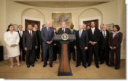 President George W. Bush is flanked by members of his Advisory Council on Financial Literacy Tuesday, Jan. 22, 2008, as he announces its establishment during a statement in the Roosevelt Room of the White House. White House photo by Shealah Craighead