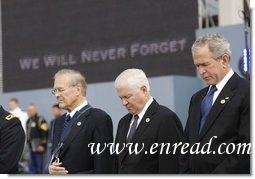 President George W. Bush is joined by former Secretary of Defense Donald Rumsfeld, left, and U.S. Secretary of Defense Robert Gates, as they bow their heads during a moment of silence Thursday, Sept. 11, 2008, during the dedication of the 9/11 Pentagon Memorial at the Pentagon in Arlington, Va. White House photo by Eric Draper