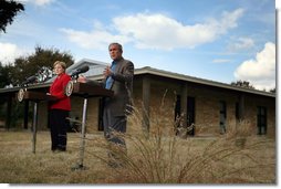 President George W. Bush speaks during a press conference with German Chancellor Angela Merkel at the Bush Ranch in Crawford, Texas, Saturday, Nov. 10, 2007. White House photo by Shealah Craighead