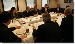 President George W. Bush meets with business and community leaders for lunch at Sam's Tavern Tuesday, Nov. 13, 2007, in New Albany, Indiana. White House photo by Chris Greenberg