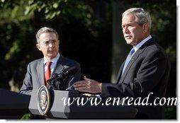 President George W. Bush gestures as he delivers his remarks during a joint press availability with Colombian President Alvaro Uribe Saturday, Sept. 20, 2008, in the Rose Garden at the White House. White House photo by Eric Draper