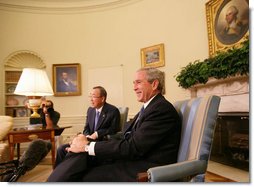 President George W. Bush and United Nations Secretary General Ban Ki-moon address members of the media in the Oval Office Tuesday, July 17, 2007, offering a short summary of their discussions on the issues of Darfur, plans for an upcoming Middle East conference, and UN plans in Afghanistan and Iraq. White House photo by Eric Draper