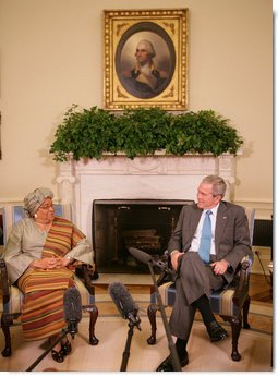 President George W. Bush meets with President Ellen Johnson Sirleaf of the Republic of Liberia in the Oval Office, Thursday, Oct. 18, 2007. President Sirleaf is Africa’s first elected female head of state. White House photo by Eric Draper