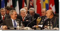 President George W. Bush and President Hamid Karzai of Afghanistan participate in the NATO Summit Meeting on Afghanistan Thursday, April 3, 2008, in Bucharest. White House photo by Eric Draper