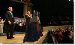 President George W. Bush acknowledges the audience as he's introduced by Secretary Michael Chertoff at Constitution Hall during a ceremony Thursday, March 6, 2008, to mark the 5th anniversary of the U.S. Department of Homeland Security. White House photo by Chris Greenberg