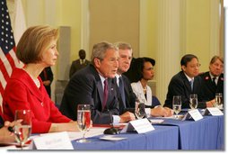 President George W. Bush delivers remarks during a drop-by meeting on the People's Republic of China Earthquake Relief Efforts Friday, June 6, 2008, at the American Red Cross National Headquarters. White House photo by Joyce N. Boghosian