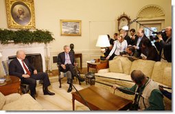 President George W. Bush is joined by U.S. Treasury Secretary Henry Paulson Monday morning, May 19, 2008, in the Oval Office, where President Bush told reporters he looks forward to working with Congress to get a good piece of legislation to help creditworthy people to stay in their homes. White House photo by Eric Draper