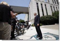 President George W. Bush speaks to reporters Thursday, July 3, 2008 outside the National Naval Medical Center in Bethesda, Md., to congratulate the Colombian government for their successful hostage rescue. White House photo by Eric Draper