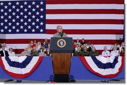 President George W. Bush addresses his remarks Wednesday, July 4, 2007, during a Fourth of July visit with members of the West Virginia Air National Guard 167th Airlift Wing and their family members in Martinsburg, W. Va. President Bush thanked all the operational units of the West Virginia National Guard for their service. White House photo by Chris Greenberg