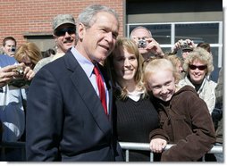 President George W. Bush poses for photos on his departure Tuesday, March 11, 2008 from Nashville, Tenn., following his address to the National Religious Broadcasters convention. White House photo by Chris Greenberg