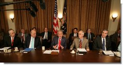 President George W. Bush emphasizes a point as he meets with his Cabinet Wednesday, Oct. 24, 2007, in the Cabinet Room of the White House. Speaking afterwards and on the topic of the California wildfires, the President said, ".I want the people in Southern California to know that Americans all across the land care deeply about them, we're concerned about their safety, we're concerned about their property, and we offer our prayers and hopes that all will turn out fine in the end." White House photo by Eric Draper