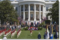 The U.S. Army Old Guard Fife and Drum Corps marches across the South Lawn during the Arrival Ceremony for Her Majesty Queen Elizabeth II and His Royal Highness The Prince Philip Duke of Edinburgh Monday, May 7, 2007, on the South Lawn.  White House photo by Lynden Steele