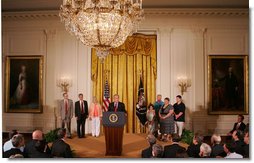 President George W. Bush, joined by families who were aided by the use of adult stem cells in their health treatments, addresses his remarks concerning his veto of S.5, the “Stem Cell Research Enhancement Act of 2007,	” in the East Room of the White House Wednesday, June 20, 2007.  White House photo by Joyce N. Boghosian